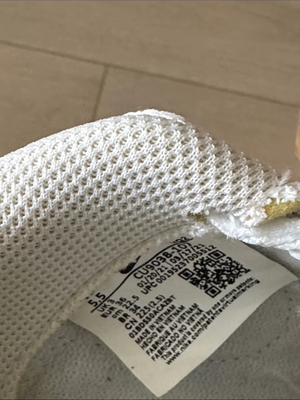 Nike White Sneakers with Yellow Swoosh